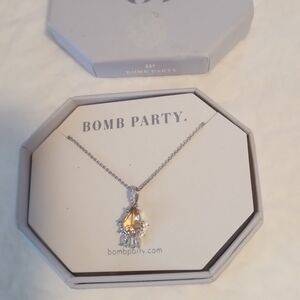 Brand RBP Necklace 20" Woman's Necklace. The Stone is a lab created peach topaz